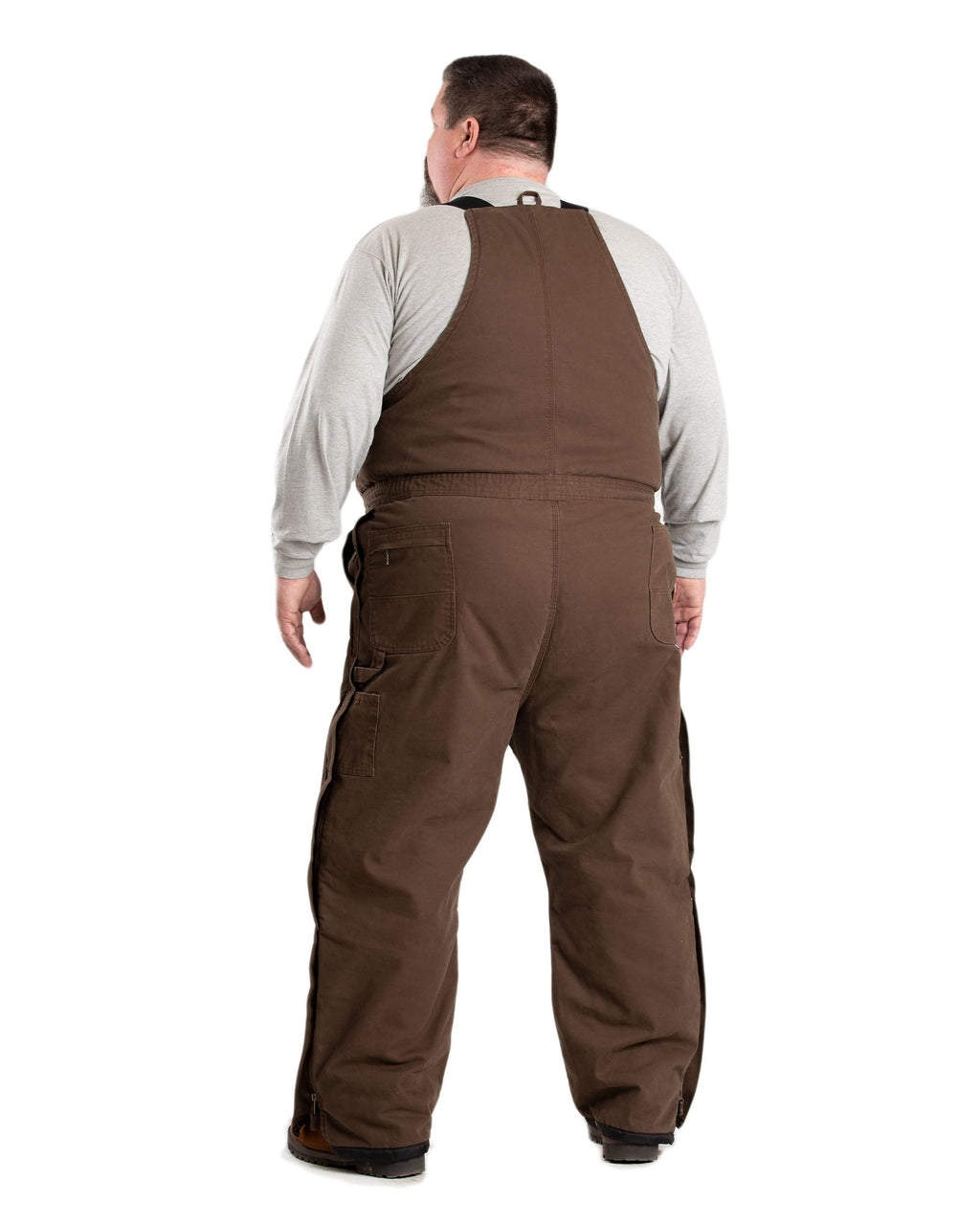 Back view of washed duck bib overalls with insulation, alternate shot