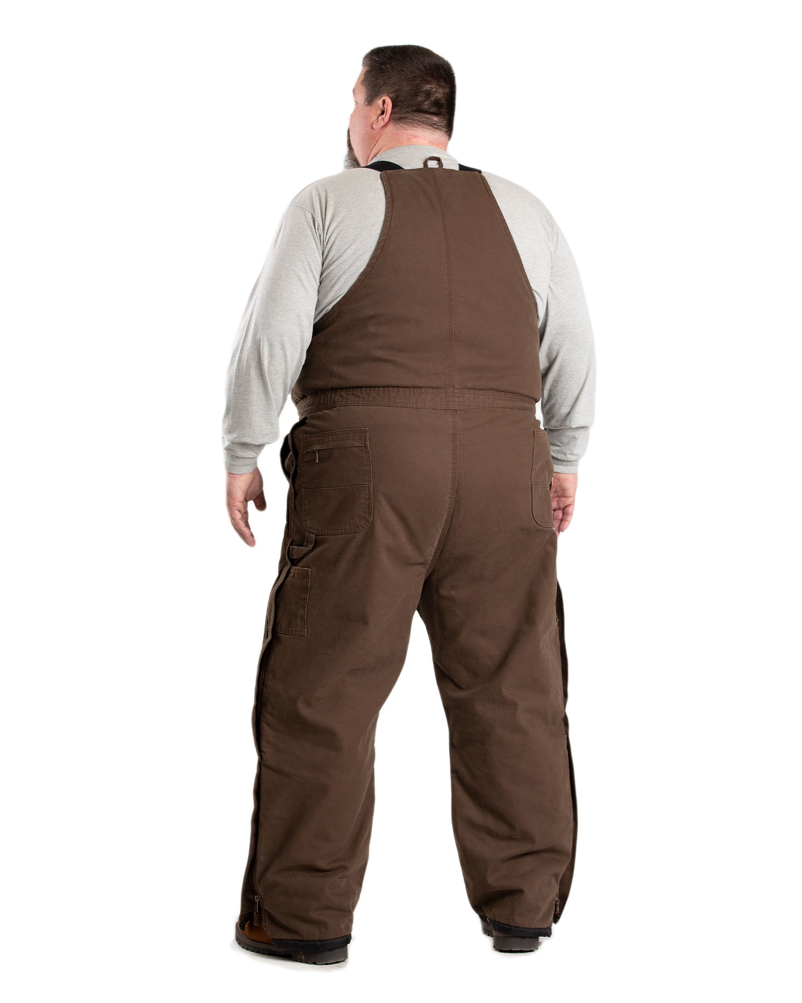 Back view of washed duck bib overalls with insulation, alternate shot