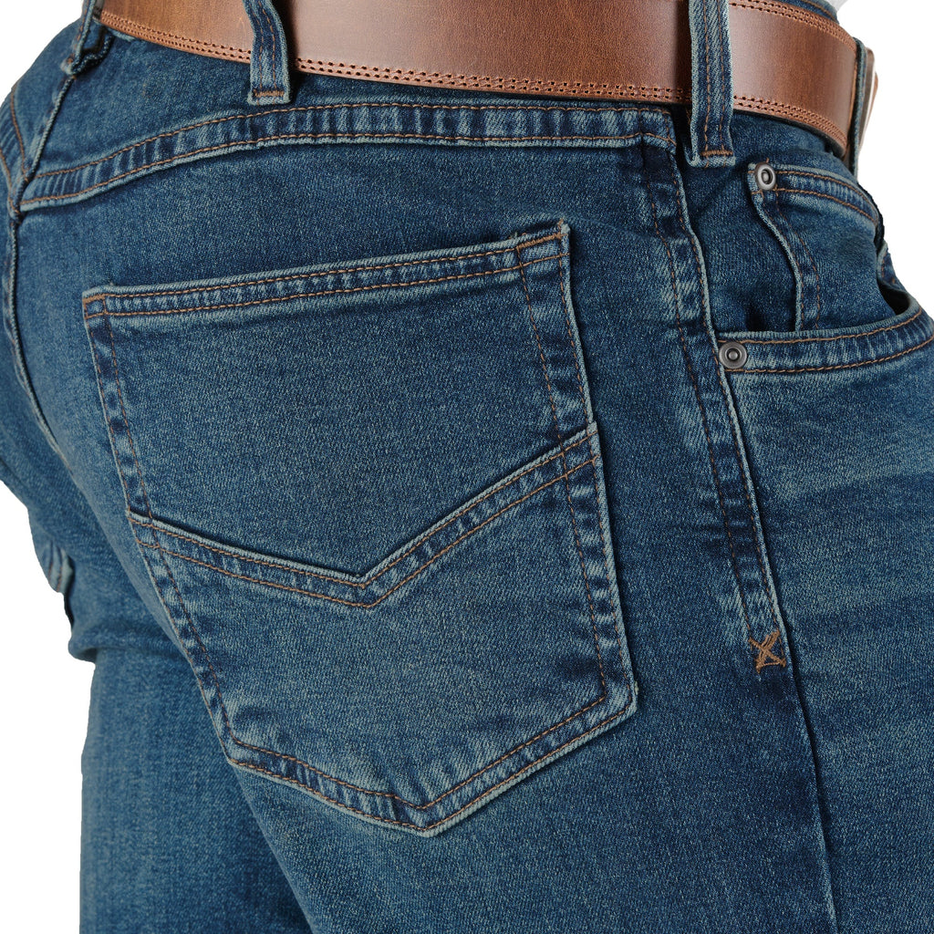 Close detail of relaxed fit bootcut denim jeans