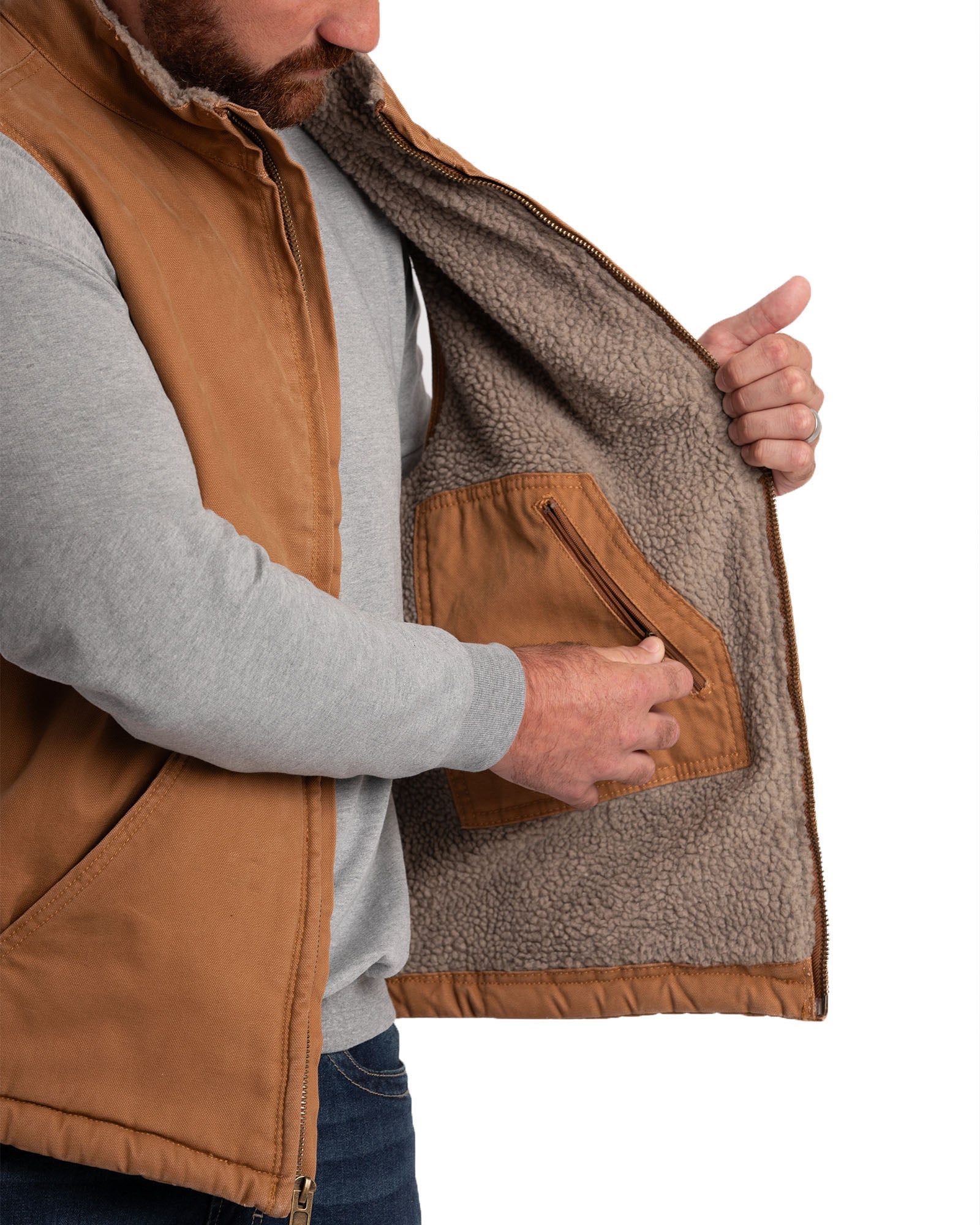 Close detail of sherpa lined washed duck vest