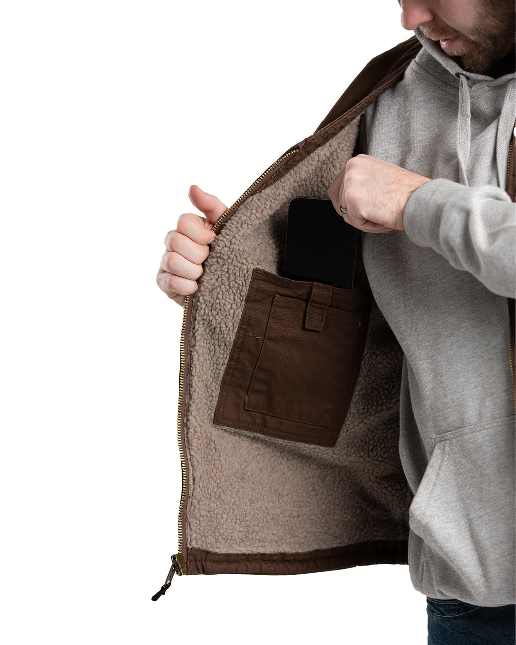 Close detail of v neck sherpa lined duck vest
