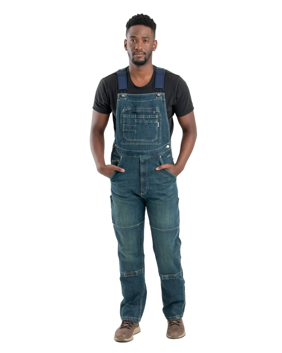 Product photo of washed denim bib overalls, alternate shot