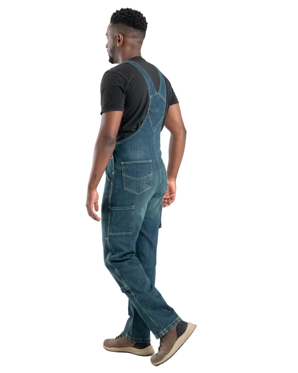 Product photo of washed denim bib overalls, alternate shot